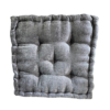 Gray square cushion with stitching on edges and 5 buttons