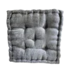 Gray square cushion with stitching on edges and 5 buttons