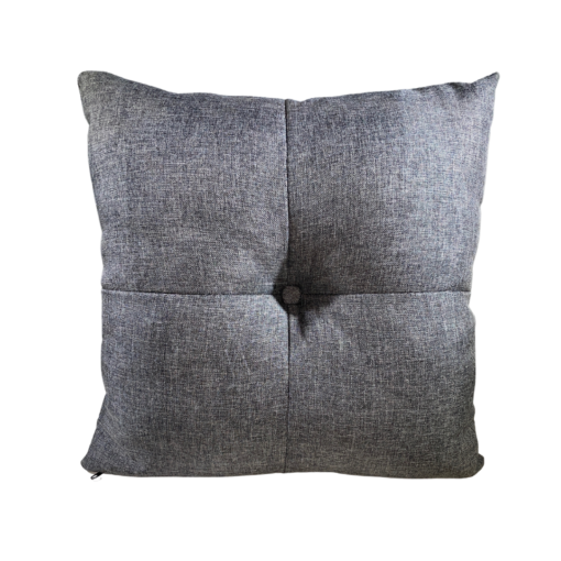 Gray square pillow with a button in the middle with 4 stitched lines from the edge to the center