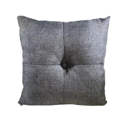 Gray square pillow with a button in the middle with 4 stitched lines from the edge to the center
