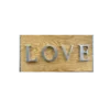 Wood with silver capital letters spelling LOVE