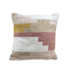 White square pillow with tan, amber, and coral blocks of color.