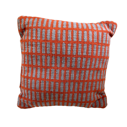 Orange square pillow with small gray rectangles in repeated pattern