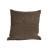 Square brown pillow with stitching down the middle from top to bottom and left to right, meeting in the middle.