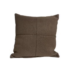Square brown pillow with stitching down the middle from top to bottom and left to right, meeting in the middle.