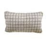 Rectangular off white pillow with gray vertical and horizontal stripes creating squares