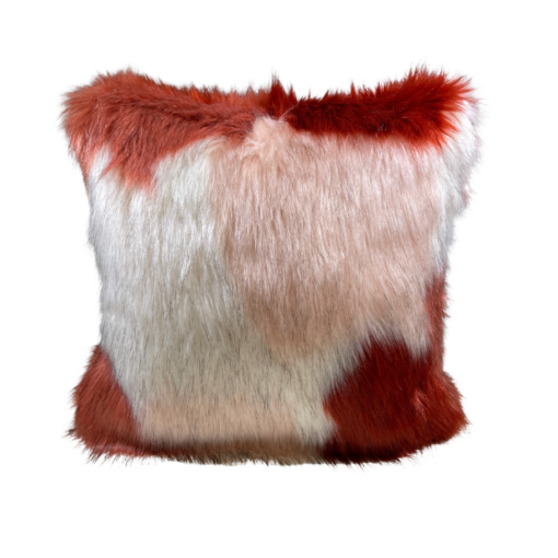 Square furry pillow with rust, white, and pink coloring