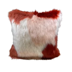Square furry pillow with rust, white, and pink coloring