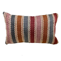 Rectangular pillow with bold stripes in pink, orange, blue, and burgandy
