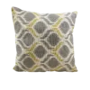 Beige square pillow with gray shapes and gray with yellow lines in between the shapes