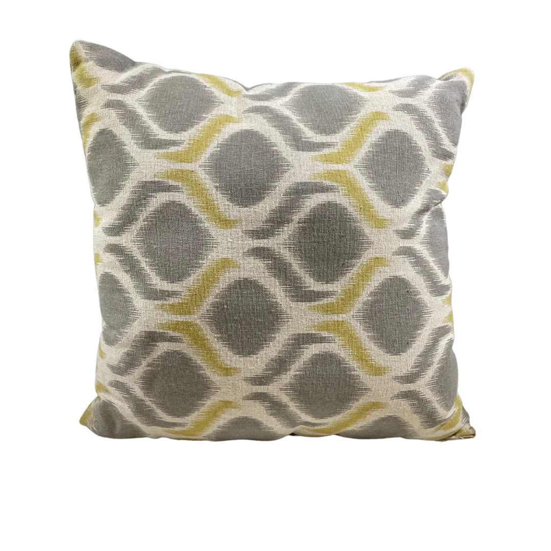 Tulum Pillow WEBP Beige square pillow with gray shapes and gray with yellow lines in between the shapes