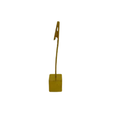 Gold. Square cube bottom with gold wire coming straight from the middle with a clip on the end to hold table numbers, seating assignments or food.