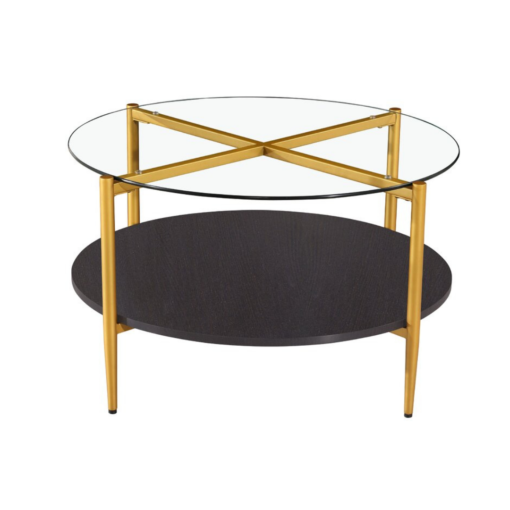 Modern round coffee table with glass top, gold legs that form an X on the top, and a black bottom shelf