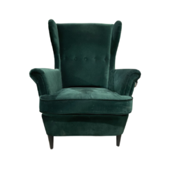 Front view of green velvet high back wing chair