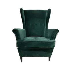 Front view of green velvet high back wing chair