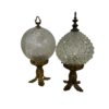 Pair of vintage decorative table top globes. Brass base with cut glass top and brass decorative top.