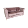 Soft pink velvet sofa with tufted back, two large cushions, square arms and gold legs. Includes two round matching pillows. Side view