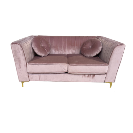 Soft pink velvet loveseat with tufted back, two large cushions, square arms and gold legs. Includes two round matching pillows.