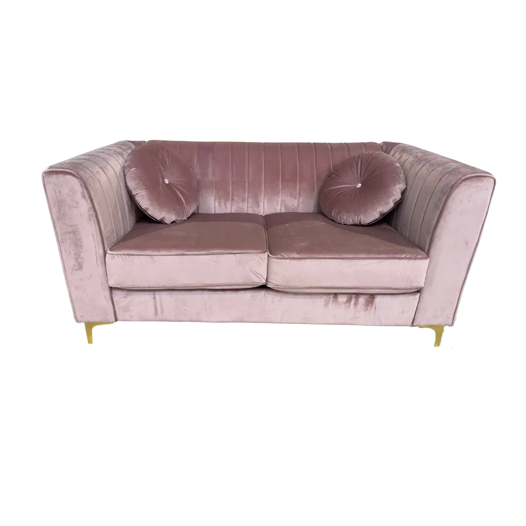 Avianna Loveseat Settee Front WEBP Soft pink velvet loveseat with tufted back, two large cushions, square arms and gold legs. Includes two round matching pillows.