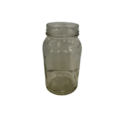 Glass jar with wide mouth and clear background