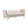 Plush velvet mid-century modern sofa with rounded arms, single seat cushion, tufted back and gold legs
