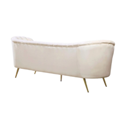 Back view of curvy velvet MCM sofa