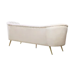Back view of curvy velvet MCM sofa