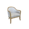 Armchair with light wood frame around the top, down the arms, and into the legs. Soft beige fabric on seat, back, and around the back of the chair. Silver nailhead trim.