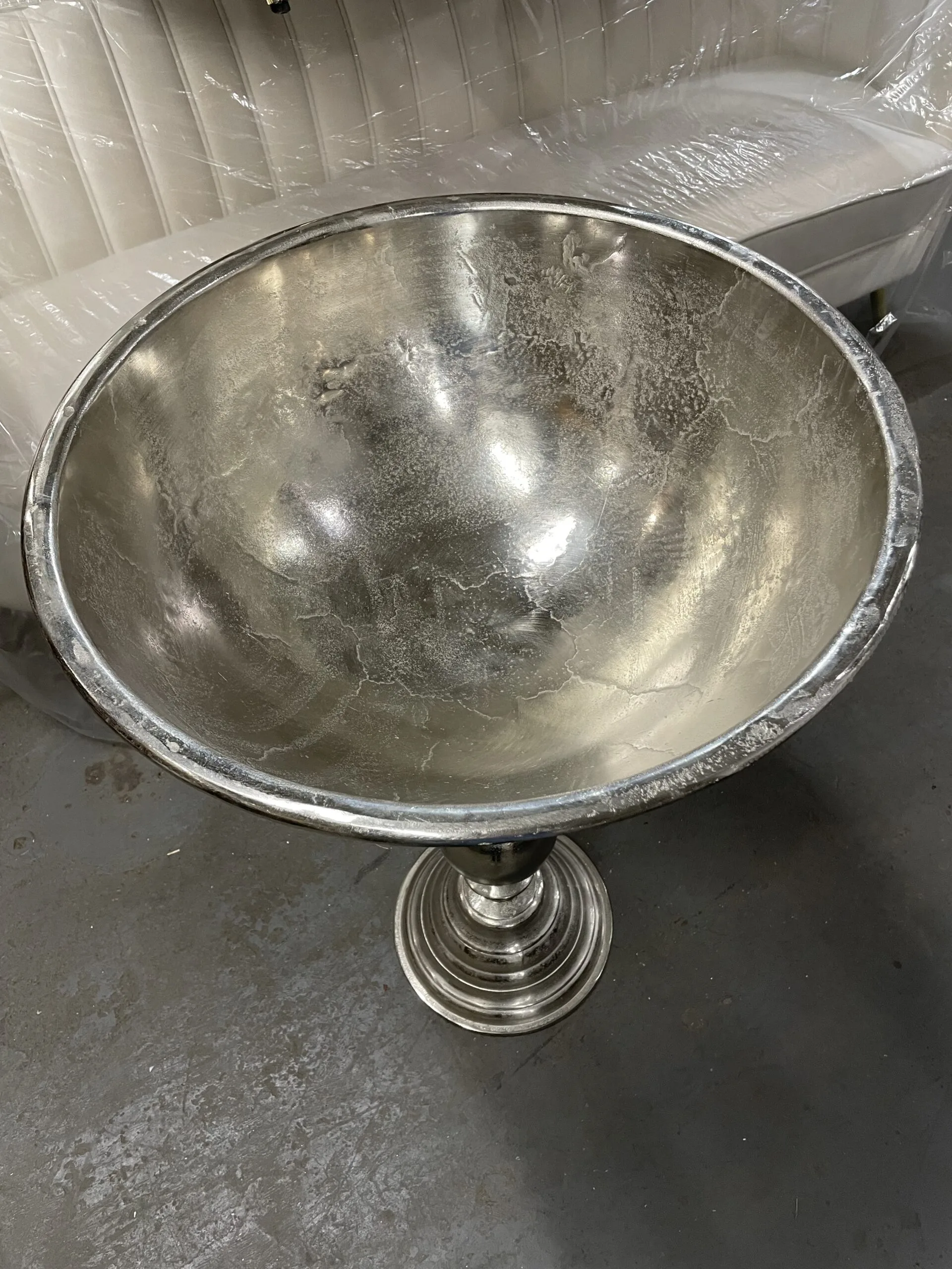 Silver Champagne bucket rental WEBP Top view of the champagne bowl that is 2 feet in diameter