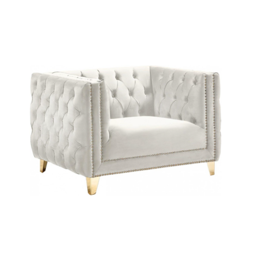 Side view of cream / white velvet square oversized chair with button tufted sides and back, gold nailhead trim and gold legs.