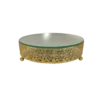 Ornate round cake stand with intricate gold design on the 2.5 inch edge. Small ball feet. Mirror top.