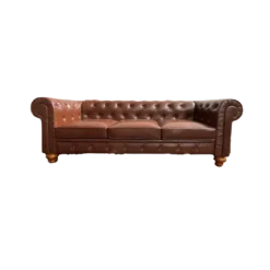 Brown faux leather sofa with 3 cushions, tufted back, round arms and brown wooden legs against a white backdrop.