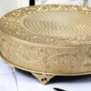 Close up showing ornate cake stand patterns on edge and top