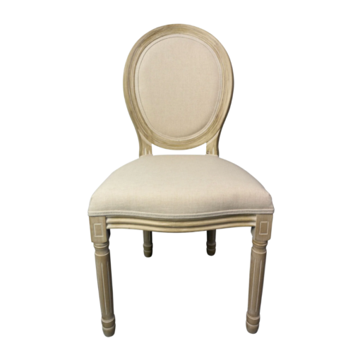 A french style chair with light wood framing and cream upholstered back and seat.