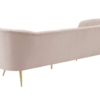 Back of a rounded velvet blush velvet sofa. Gold legs