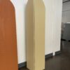 Wooden arch panels over 7 feet tall. Two panels shown - one is burnt orange and flat and the other is beige and folded.