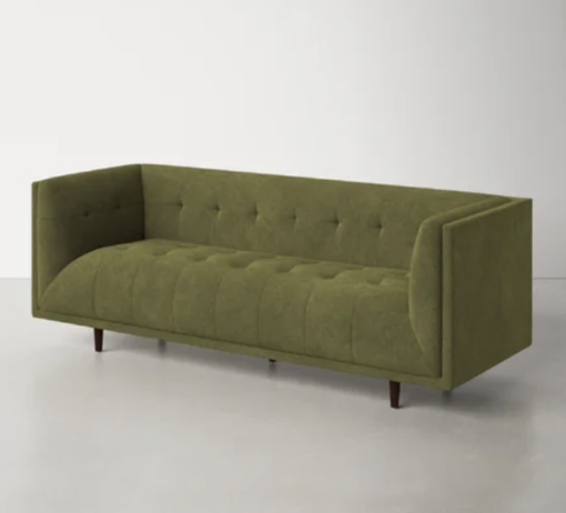 Olive green velvet square sofa at an angle showing the straight flat side