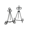 Two mismatched black metal table top easels. One has a pointy top and one has more curved design.