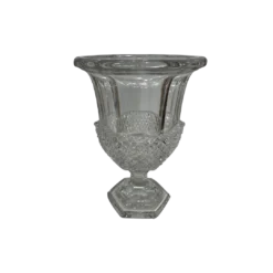 Glass cut, crystal vase with a pedestal foot in a hexagon. Detail cut out on the bottom half of the vase.