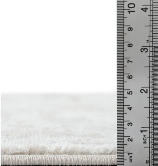 Ruler showing that the pile is 1 centimeter high