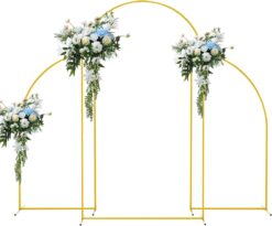 Set of 3 minimal gold arches. Middle arch is tallest with full curve. Two side arches on either side with a straight line on one side and curve on the other. Free standing and gold