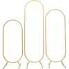 Set of 3 gold freestanding ovals in different heights.