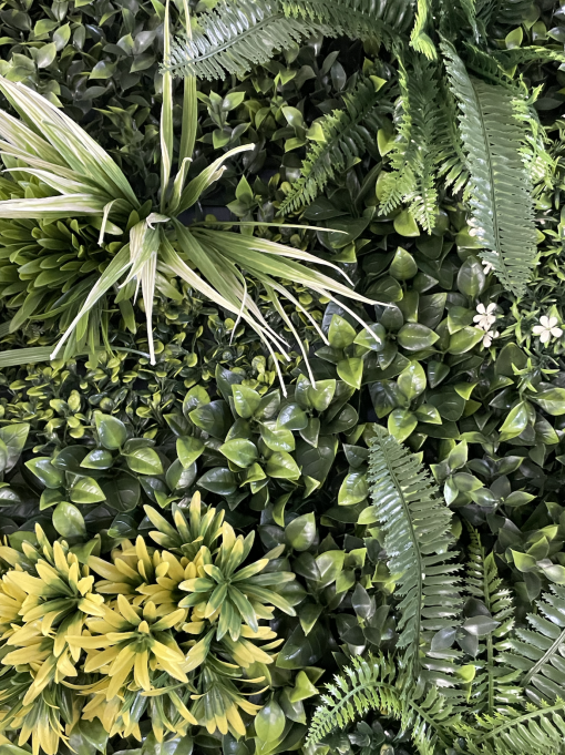 Detail on the greenery wall with texture, colors, and depth