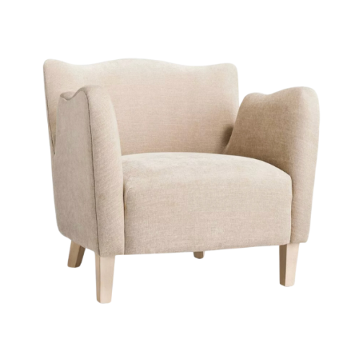 Velvet wing arm chair in beige. Scallop top, high arms, light wooden legs.