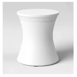 Front view of the Carden Side Table showcasing its hourglass design and textured faux stone finish.