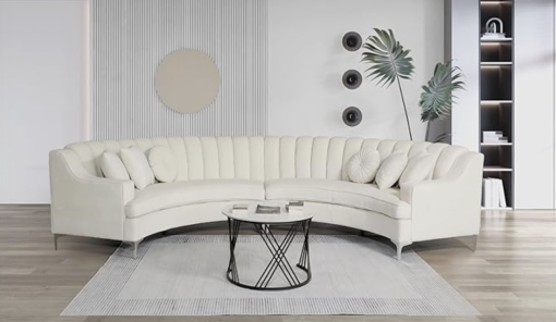 1 cream curved sectional in a living room