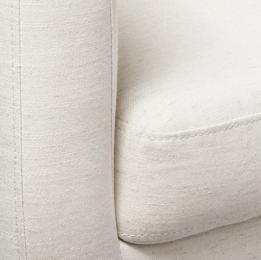 Natural linen barrel chair close up