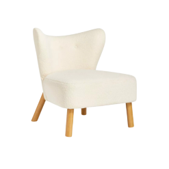 Sculpted accent chair with slight wingback, armless, and light wooden legs