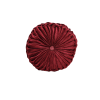 Maroon round velvet round pillow with a button in the middle and scrunched pleats out to the edges