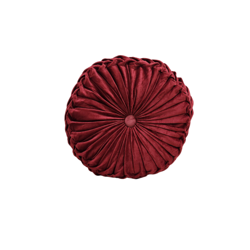 Maroon round velvet round pillow with a button in the middle and scrunched pleats out to the edges